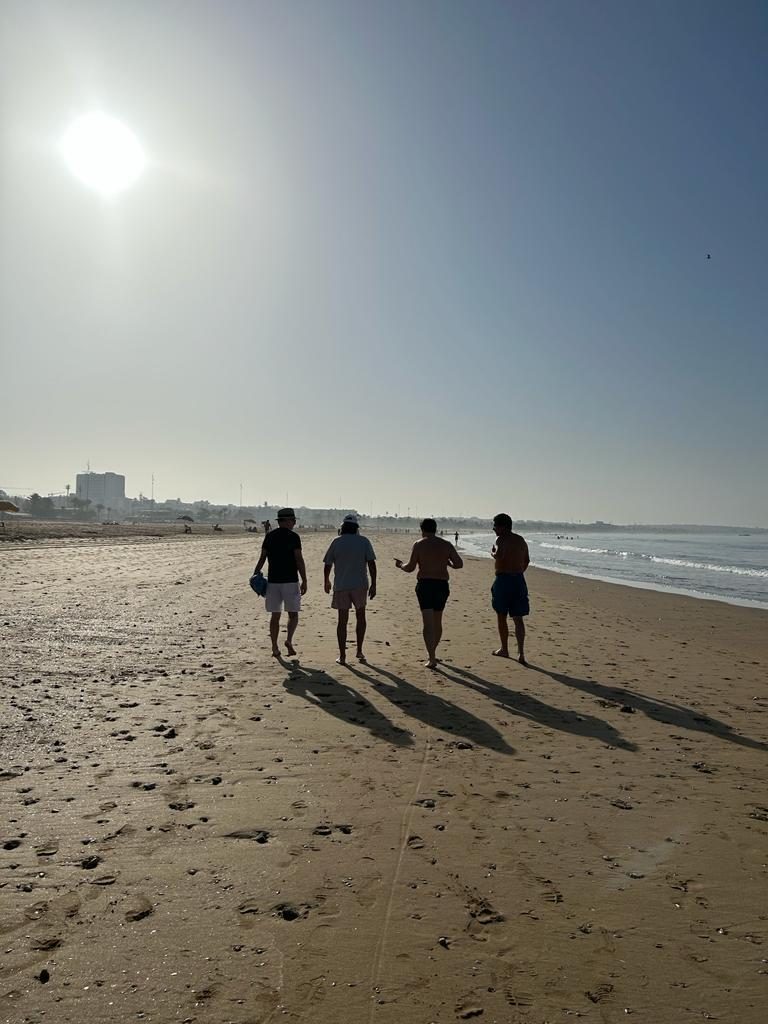 Players walking along Agadir beach during the MBT
